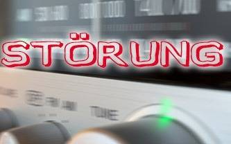 Störungszeichen vor einem Radio