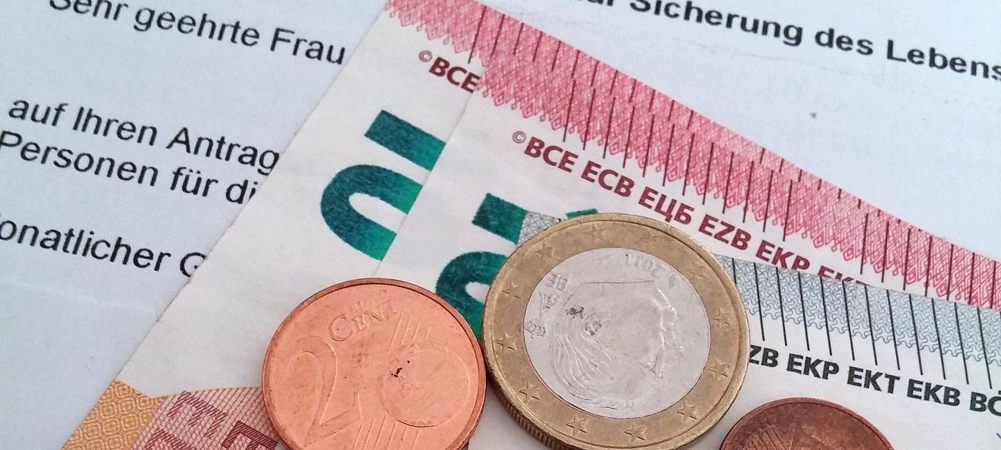 Geld auf einem Bewilligungsbescheid