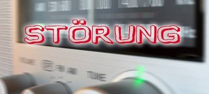Störungszeichen vor einem Radio