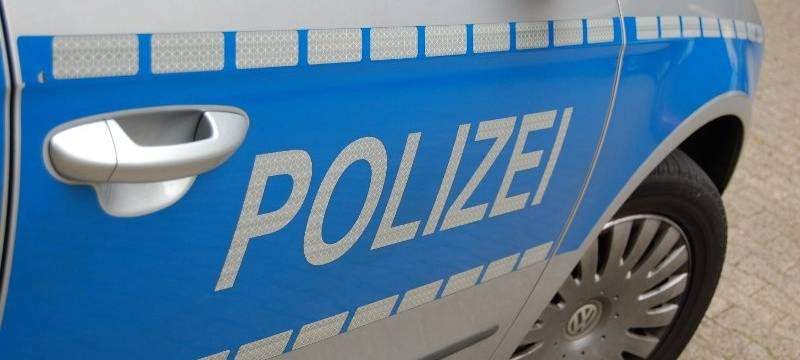 Symbolbild Polizeiwagen Seitenansicht